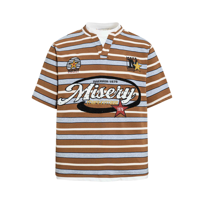 Brown and blue striped varsity tee with embroidered retro Misery graphic and star patches on a white background