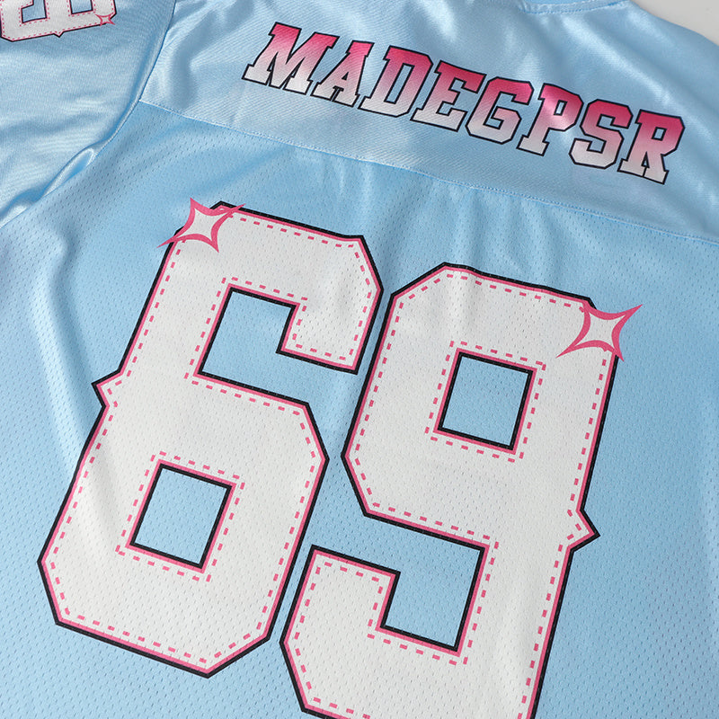 Baby blue mesh football jersey with pink-and-white 69 graphic and Madegpsr lettering, Y2K streetwear style