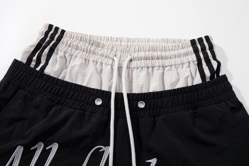 Script Graphic Wide-Leg Track Pants | Contrast Panel