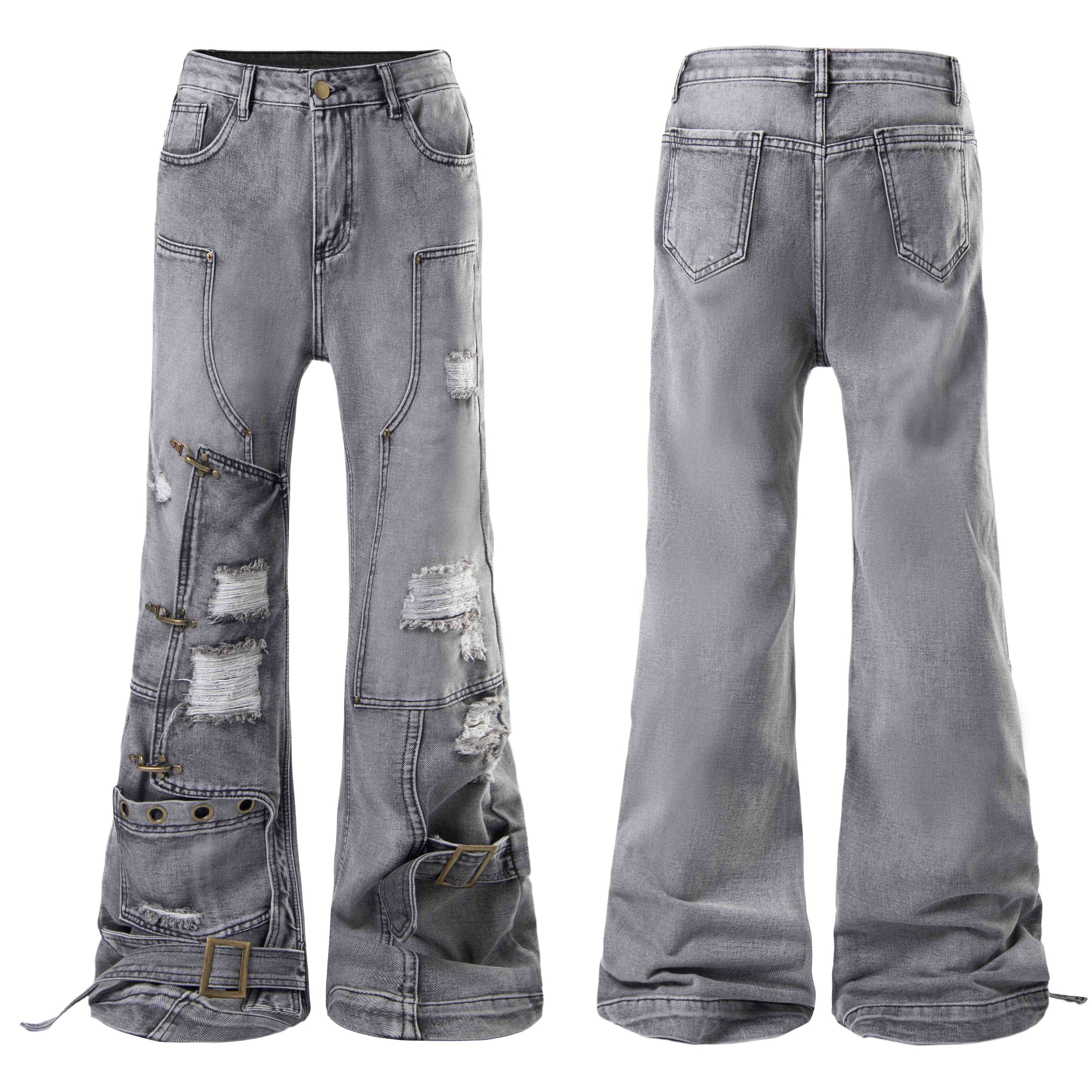 Front and back view of grey washed distressed flare jeans with buckle straps, ripped knees, and exposed seam panel constructi