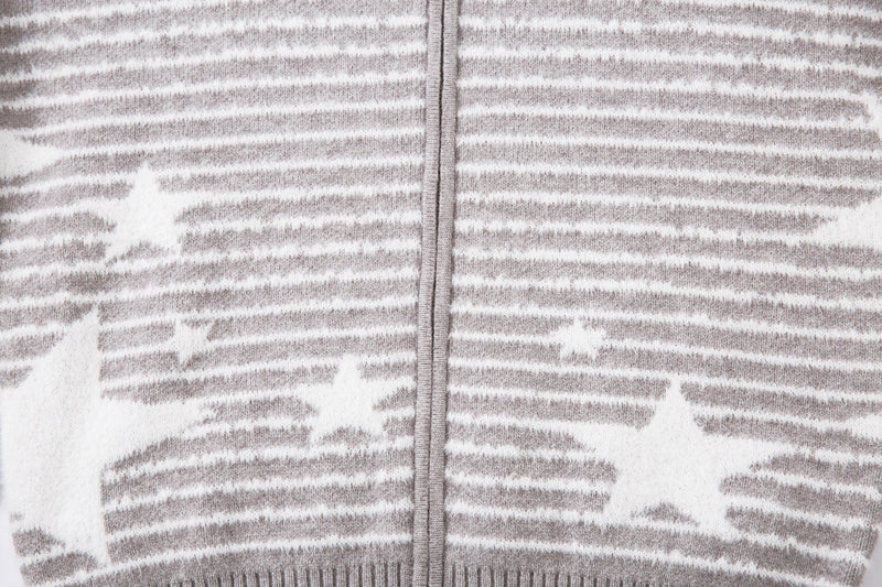 Close-up of the gray striped knit front panel with center zipper seam