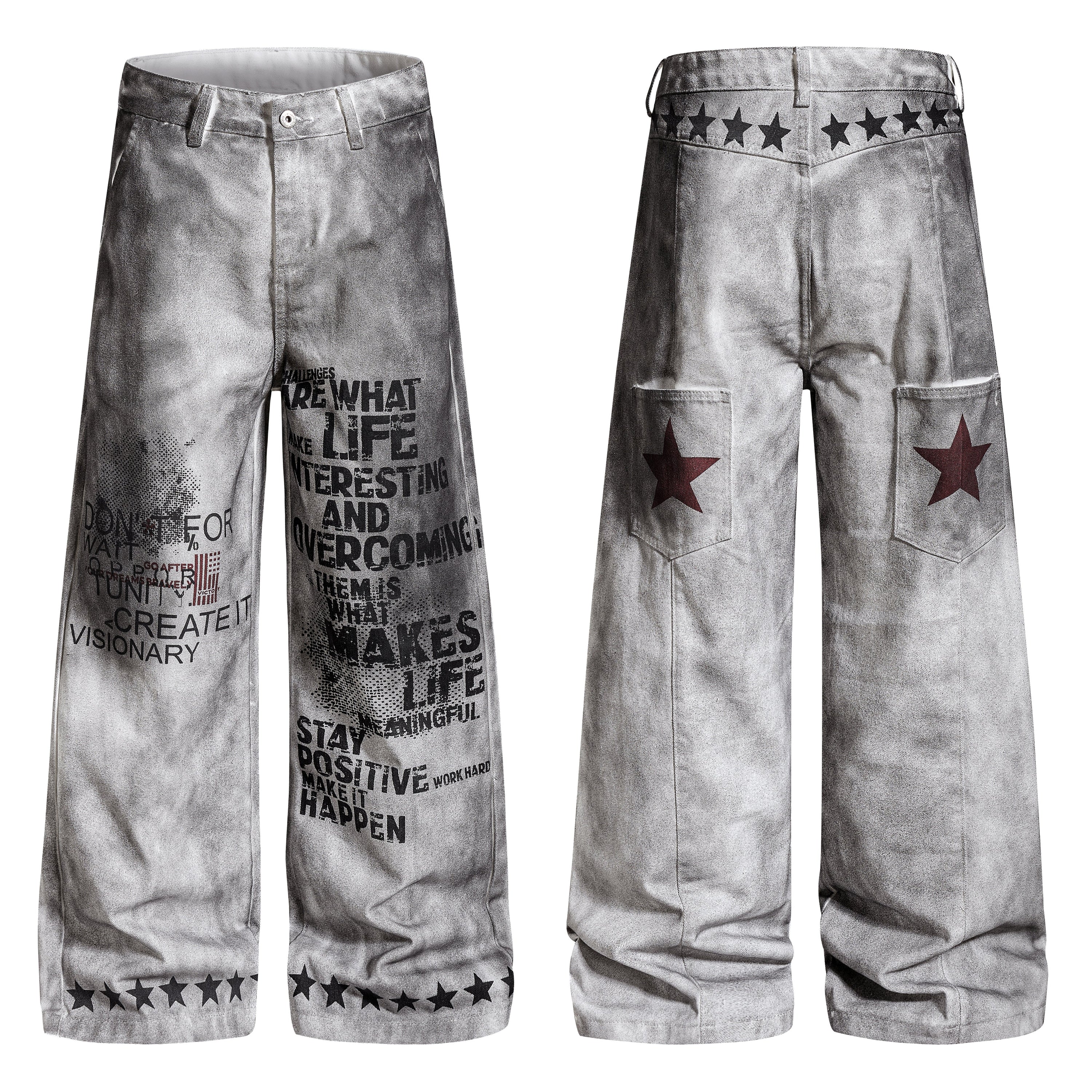 Front and back view of grey washed wide-leg pants with bold typographic graphic print and star detailing on hem and waistband