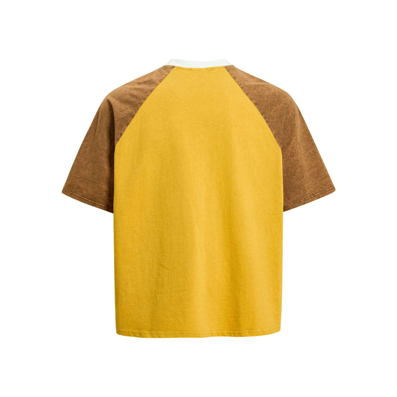 Vintage washed raglan tee in mustard yellow with brown sleeves, shown from the back on a clean white background
