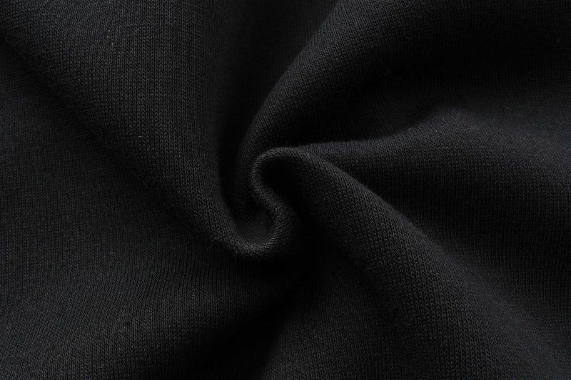 Close-up of black fabric texture on the hoodie