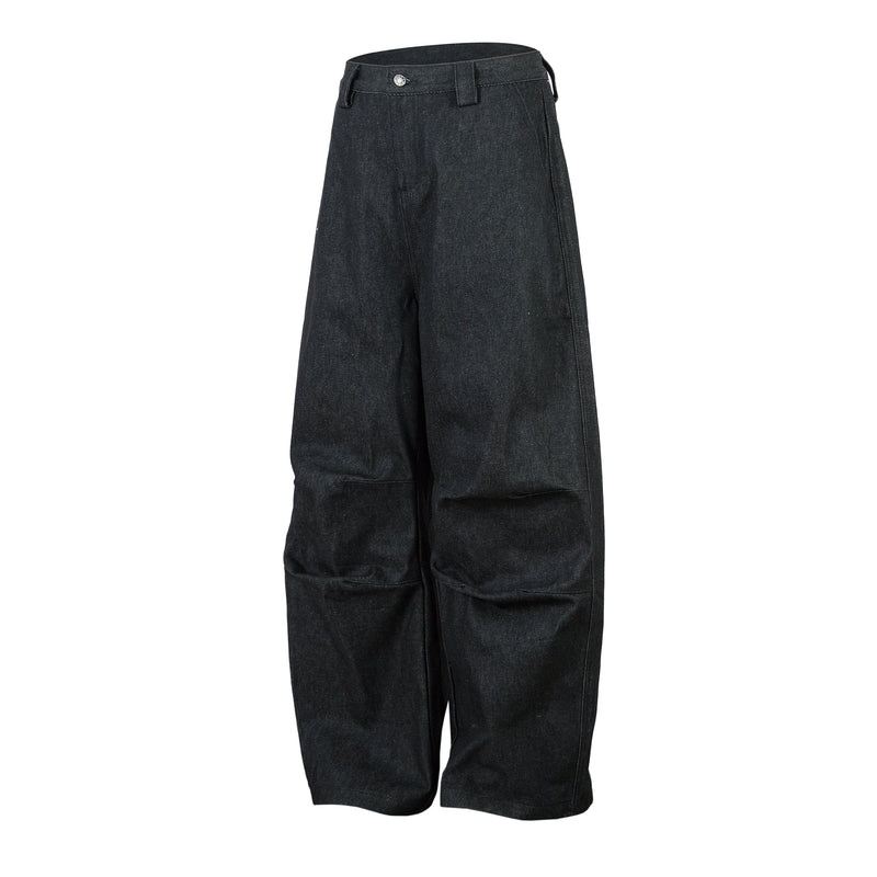 Dark denim wide-leg pants shown angled front view with pleated legs and belt loops