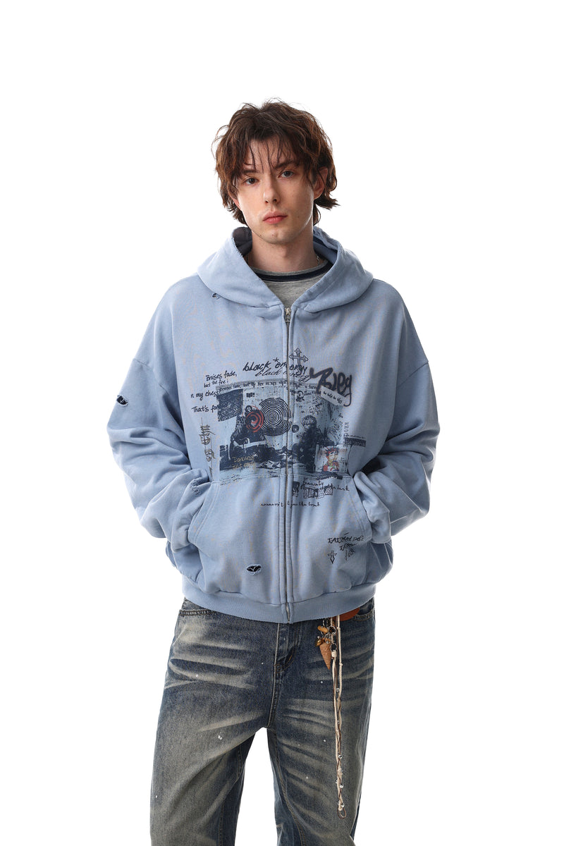 Light blue graphic zip-up hoodie worn by model, front view