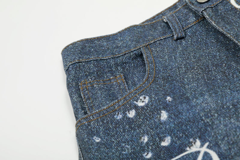 Close-up of the back waistband and pocket with small white paint splatters