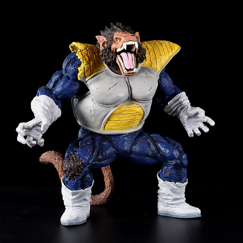 The Seakoff Great Ape Vegeta Collectible Figure from Dragon Ball Z, a 36cm premium action figure, features a fierce creature with a tail and sharp fangs. It wears a blue suit with yellow shoulder armor and stands posed with bent arms and an open mouth, set against a black background.