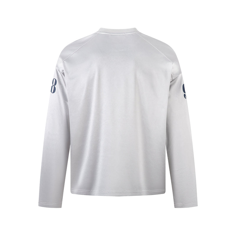 Back view of white long sleeve jersey tee with number 8 on sleeves