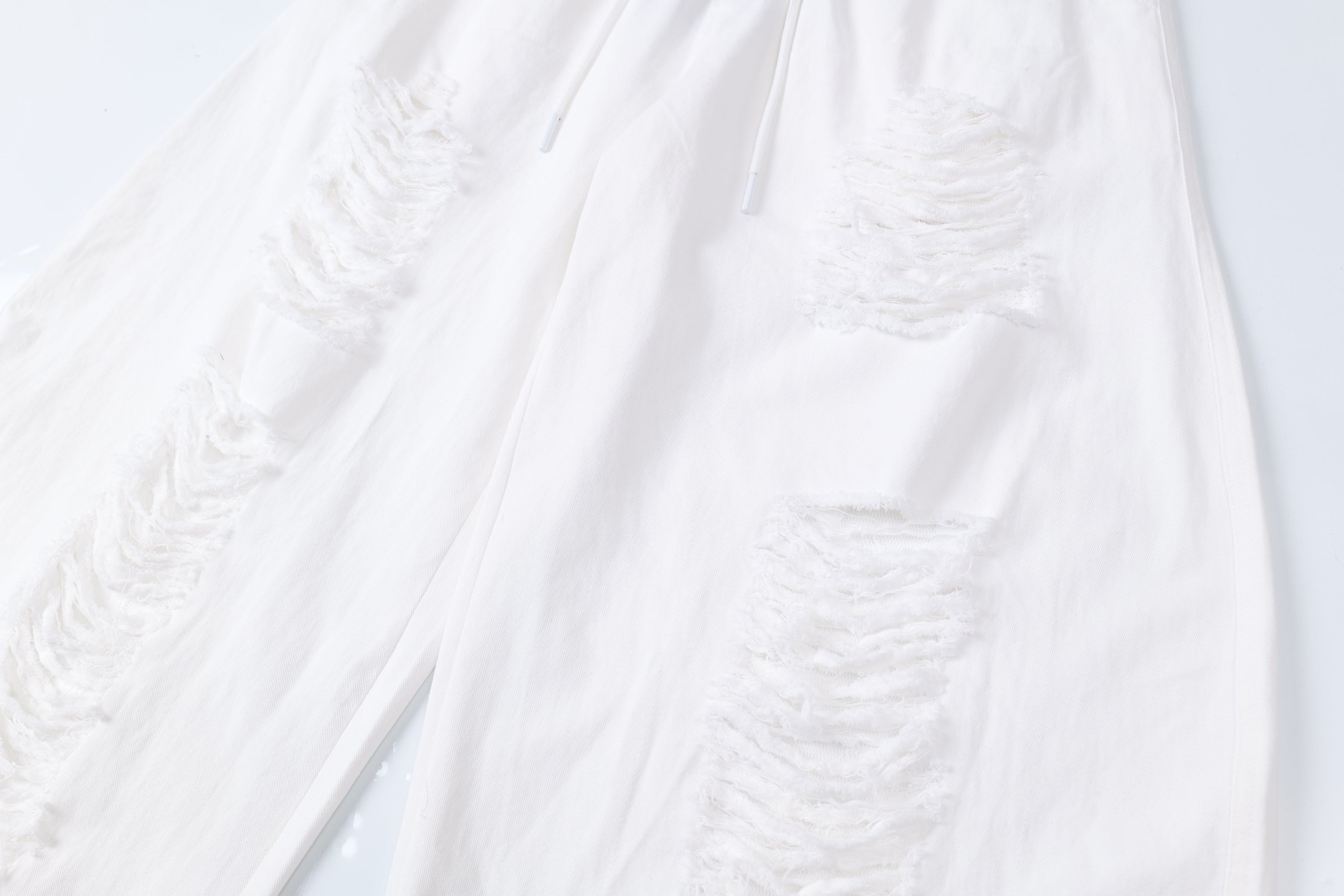 Omirad Distressed Wide-Leg Pants | White Cotton Barrel Fit