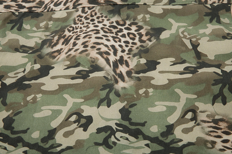 Close-up of leopard print panel across the back of the camo shirt