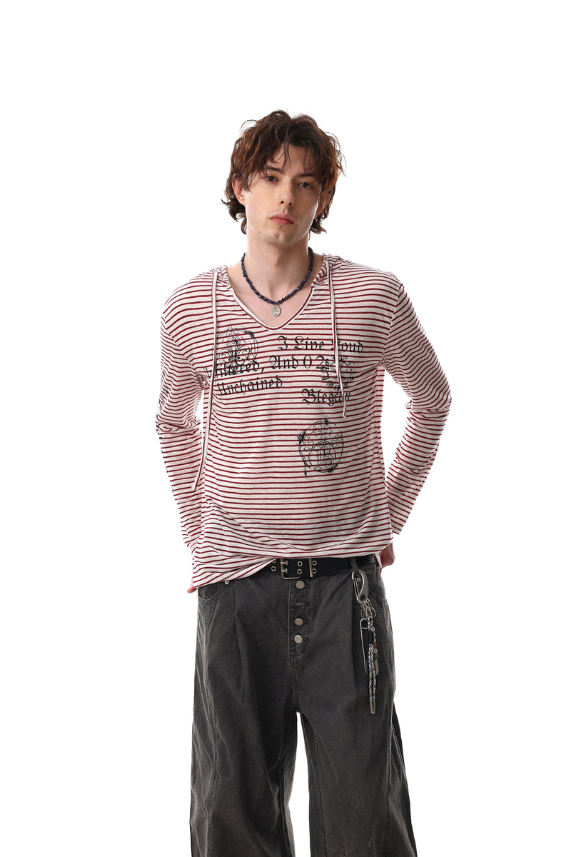 Red striped graphic hoodie tee worn with black pants, front view on model