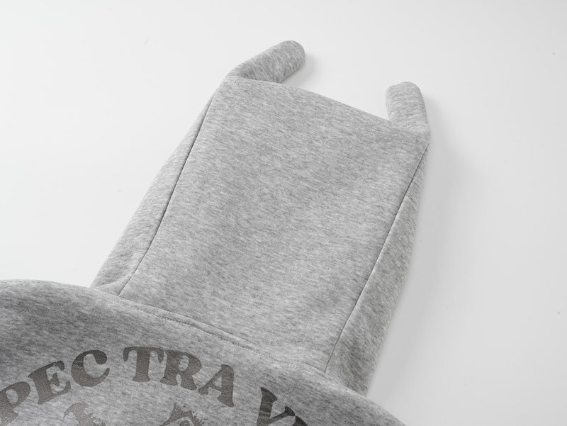 Close-up of gray hoodie hood back with pointed horn details
