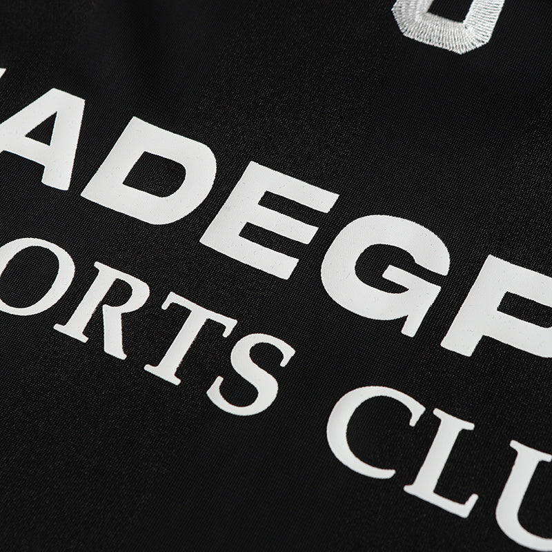 Black sports club football jersey T-shirt with bold white MADEGPSR lettering and number 9 print