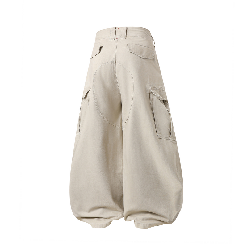 Beige wide-leg cargo pants with curved back seam and flap pockets, back view