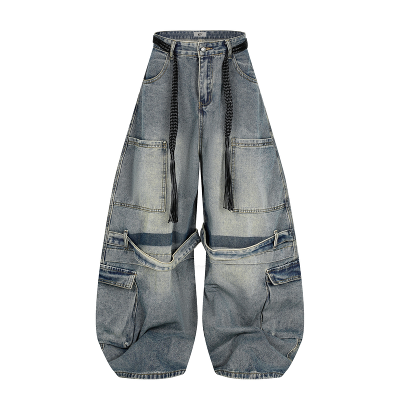 Wide leg layered blue jeans with black braided waist ties, front view