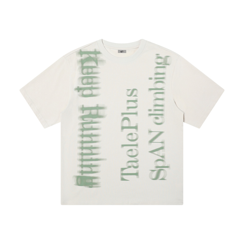 Oversized white graphic tee with blurred green vertical text print and washed streetwear style