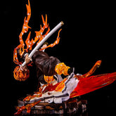 The Rengoku Kyojuro Demon Slayer Figure - Flame Hashira (28cm, High-Quality PVC) features him leaping with his flaming sword, surrounded by vibrant orange flames against a black backdrop, and standing on a stylized broken wood base.