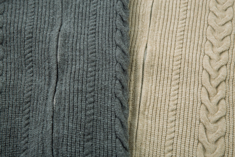 Side-by-side close-up of dark gray and beige cable knit sweater jackets