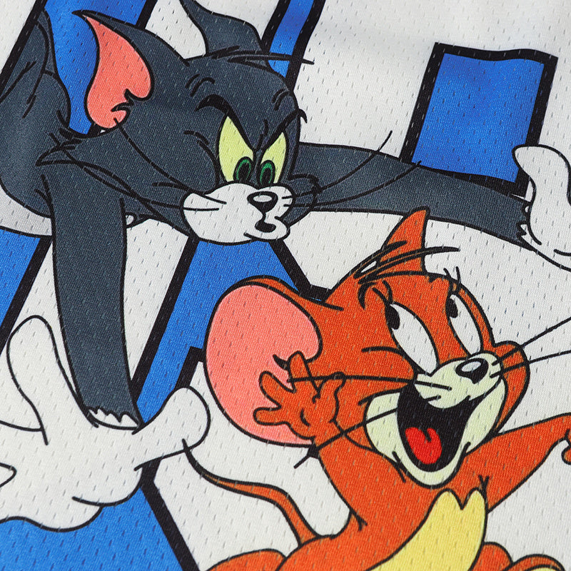 Tom and Jerry cartoon graphic on white mesh football jersey with bold blue varsity-style accents