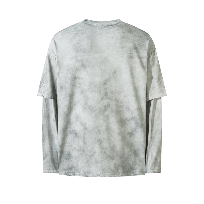 Back view of gray layered long sleeve tee with faded marbled wash