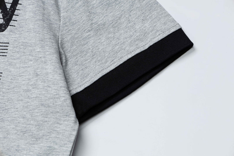 Gray ringer T-shirt sleeve with black cuff and vintage music sheet graphic print on soft heathered fabric