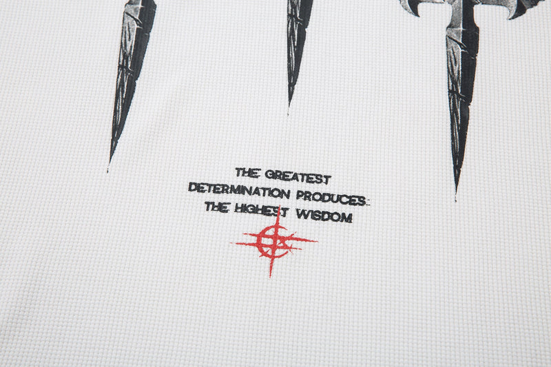 Lower front graphic on white tee showing black text and red symbol near hem