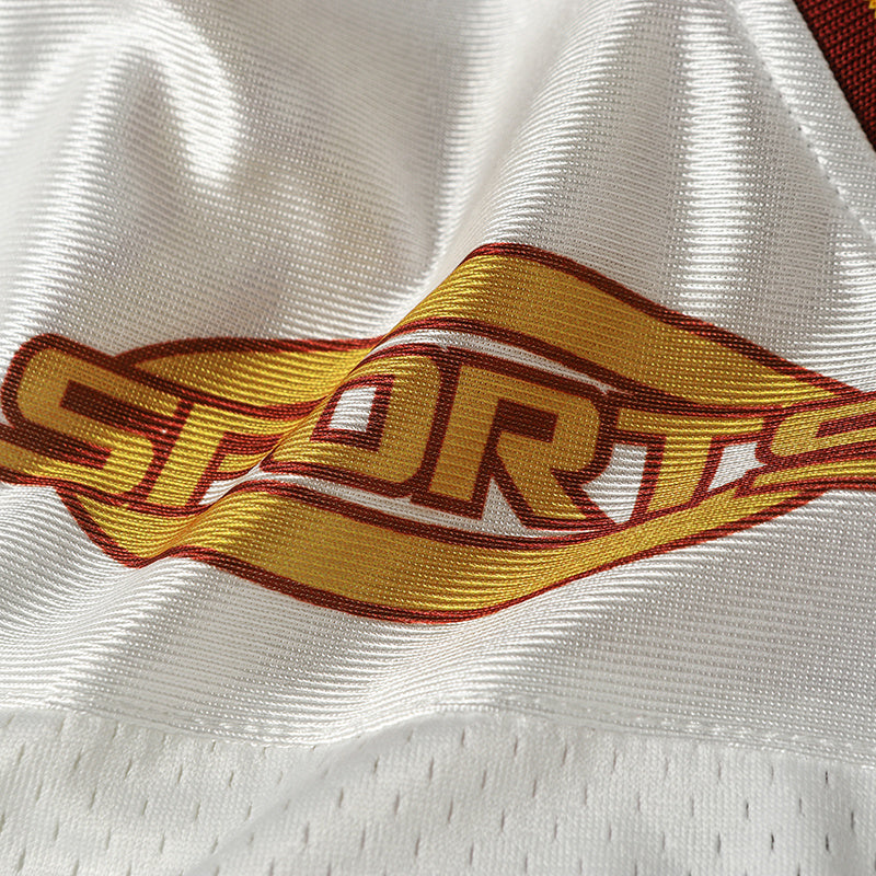 White Seakoff performance football jersey with gold and red SPORT graphic and textured fabric close-up
