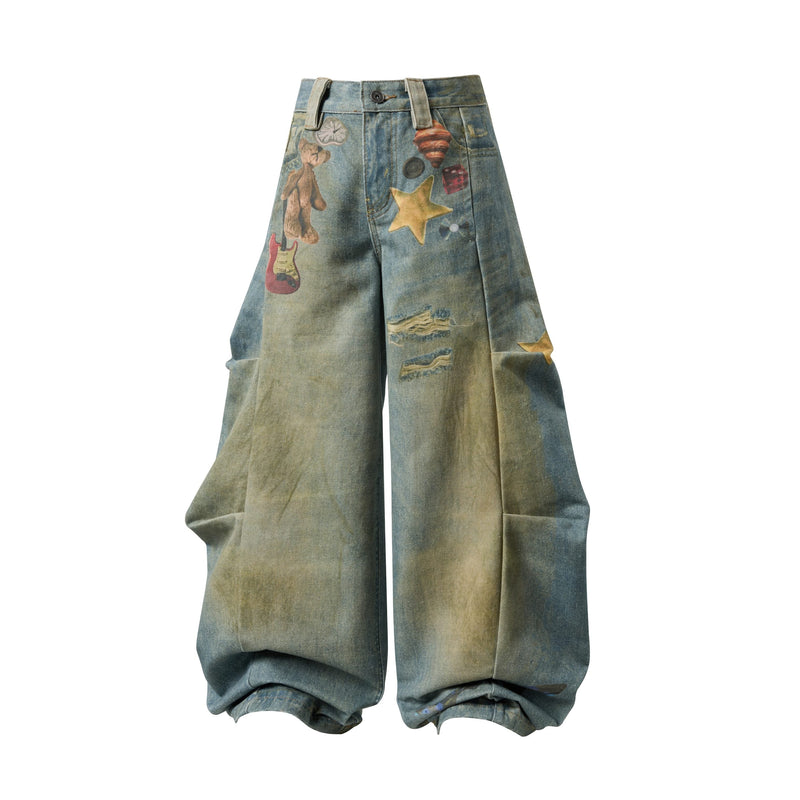 Front view of wide leg blue denim jeans with graphic prints and a high waist