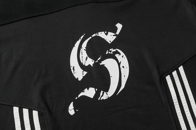 Black oversized street tee with white distressed graphic and three white sleeve stripes