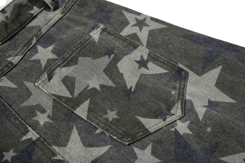 Close-up of back patch pocket on gray star print denim