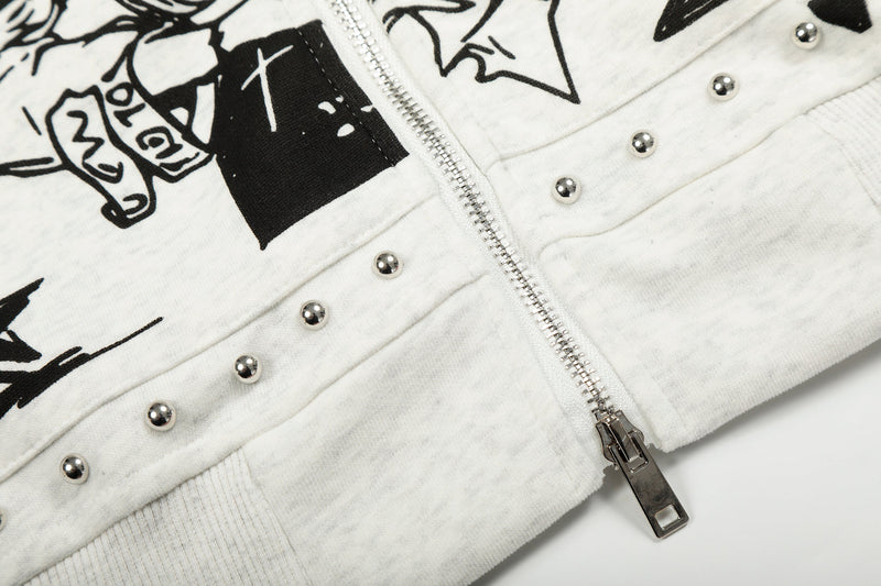 Close-up of white hoodie lower front with zipper and silver studded hem