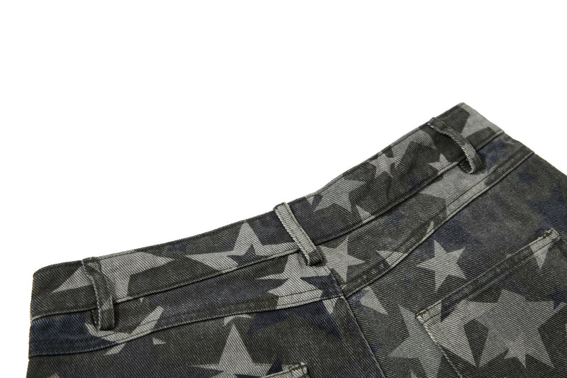 Close-up of back waistband and pocket edge on star print denim jeans