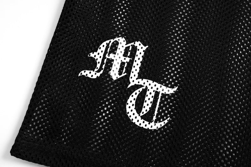 Black mesh athletic tee with white multi-cross graphic print on a boxy jersey front