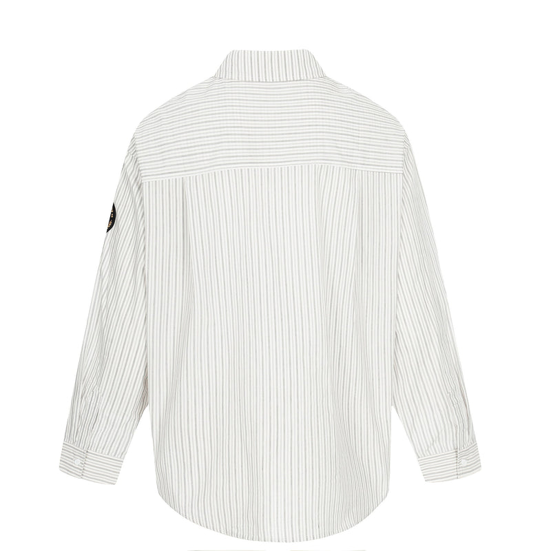 Back view of cream striped button-up shirt with long hem and buttoned cuffs