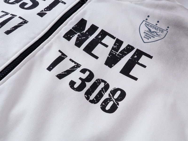 Close-up of white hoodie chest graphic beside the black zipper and crest patch on the right side
