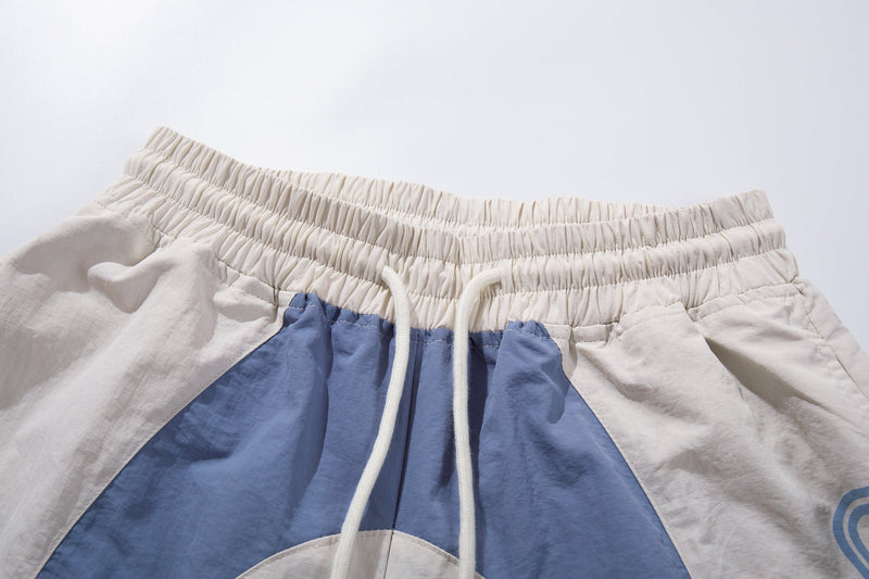 Omirad Graphic Panel Track Pants | Wide-Leg Streetwear