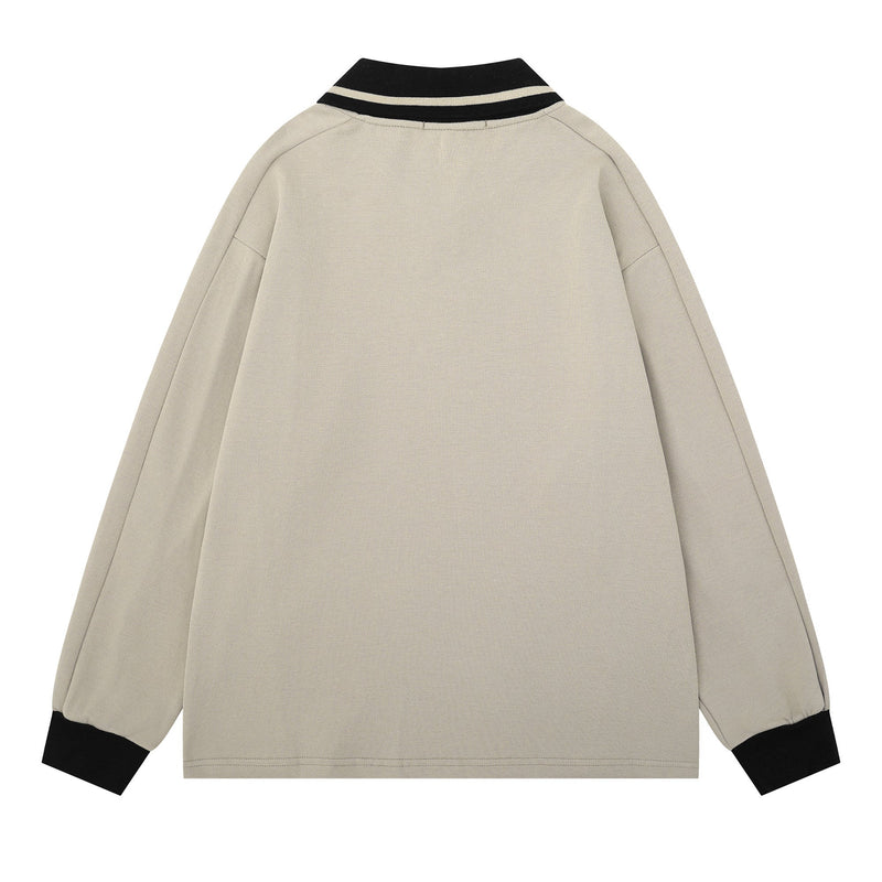 Beige polo sweatshirt back view with black collar and black cuff details