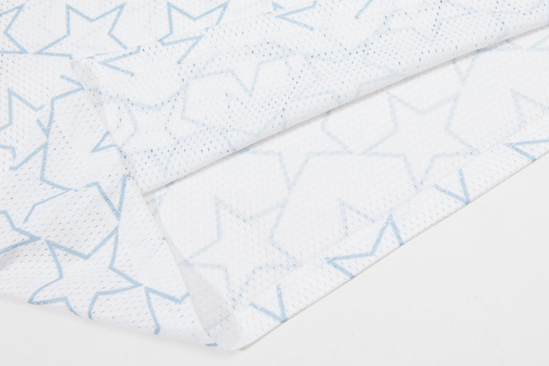 White mesh football jersey fabric with light blue star pattern, showing breathable perforations and textured streetwear style