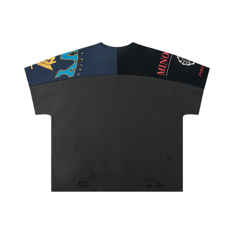 Oversized black distressed graphic tee with navy and black paneling, bold streetwear prints, and worn details