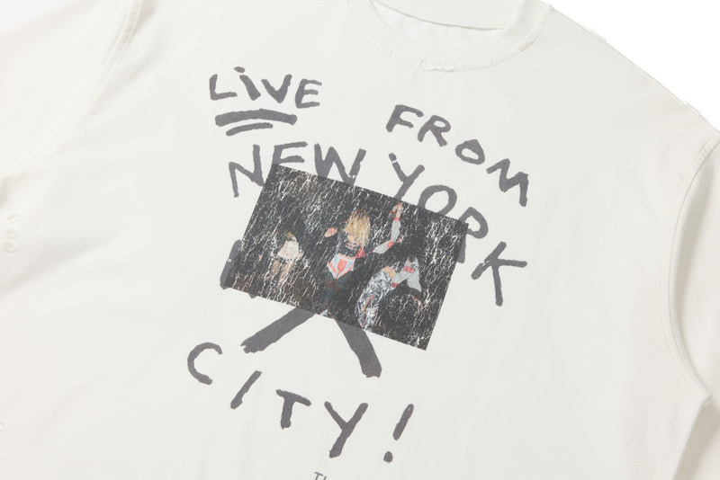 Close-up of white tee front graphic reading Live From New York City