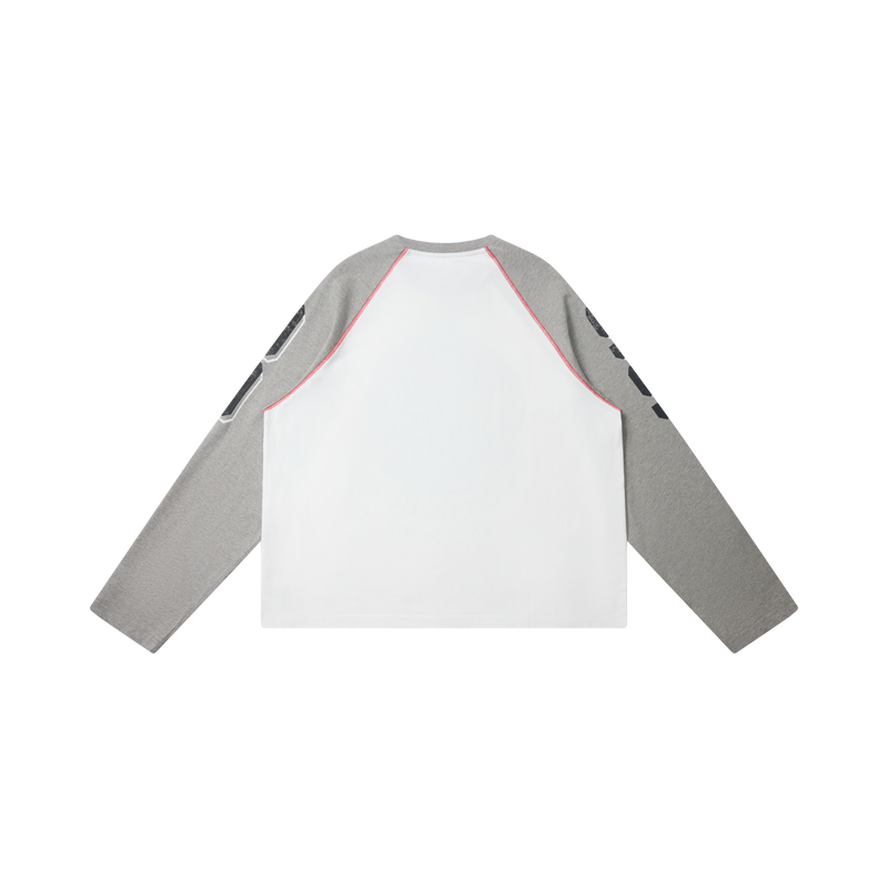 Back view of the white tee with gray sleeves and red contrast stitching