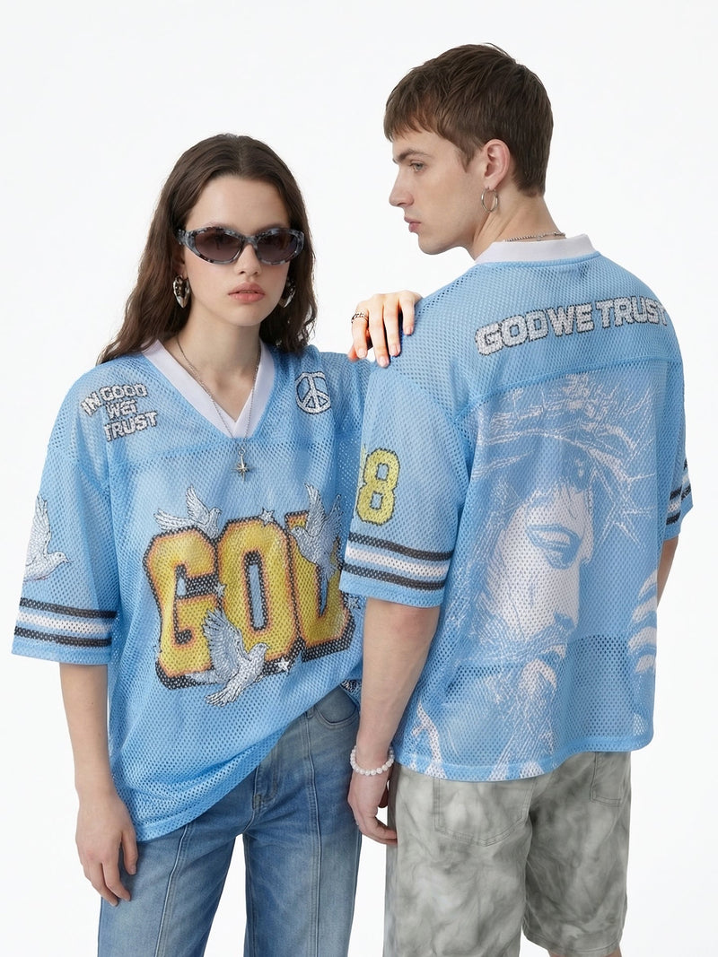 Blue mesh jersey T-shirt with God We Trust and peace sign graphics, styled on two models in streetwear fit