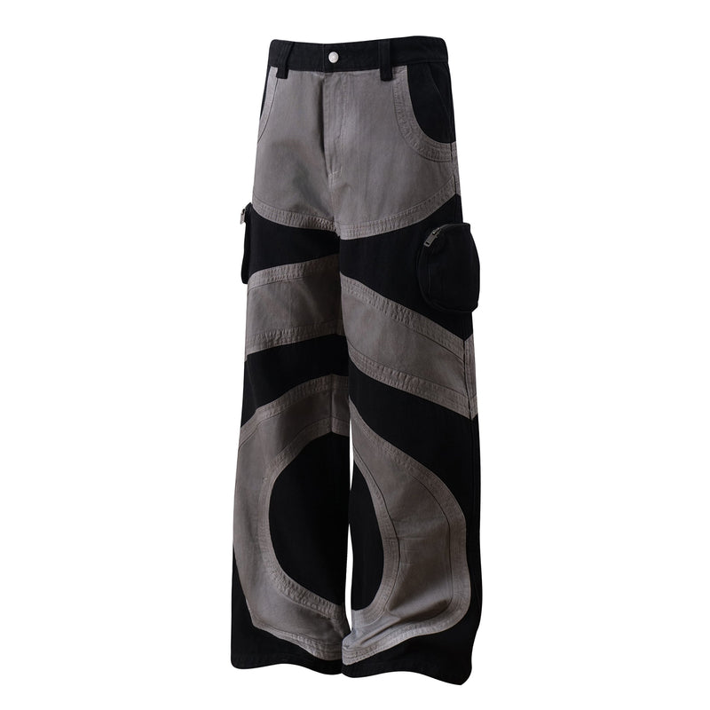 Three-quarter front view of gray and black wide-leg cargo pants with side cargo pockets
