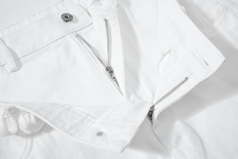 Close-up of white waistband with zipper fly and button closures