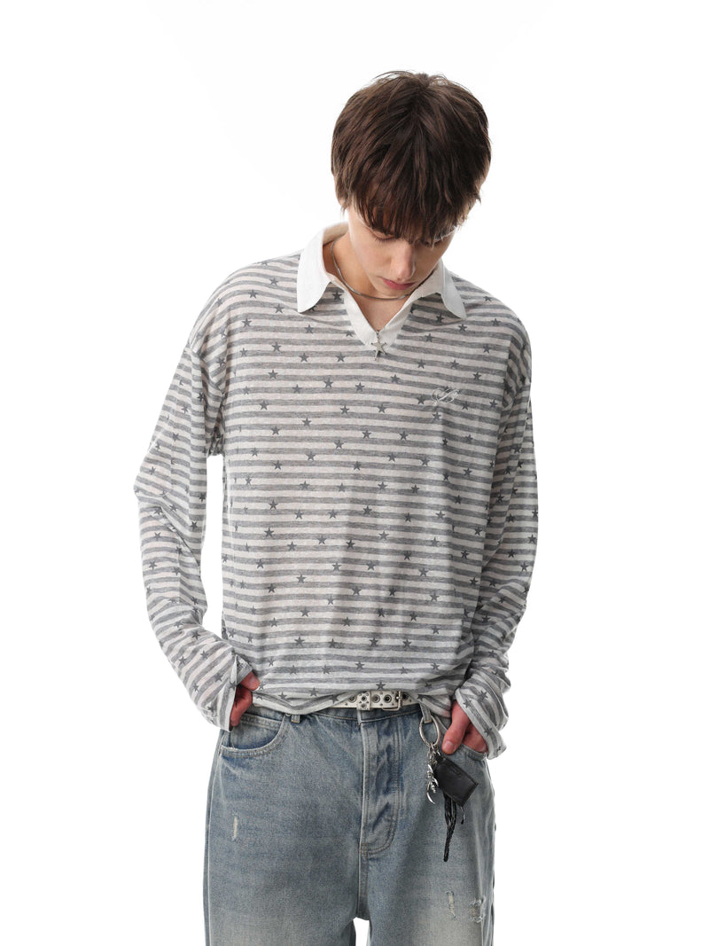 Close-up of gray star stripe polo worn with white collar and V-neck opening