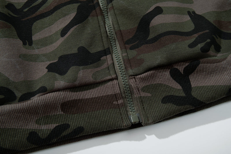 Close-up of hoodie hem with zipper and ribbed knit waistband