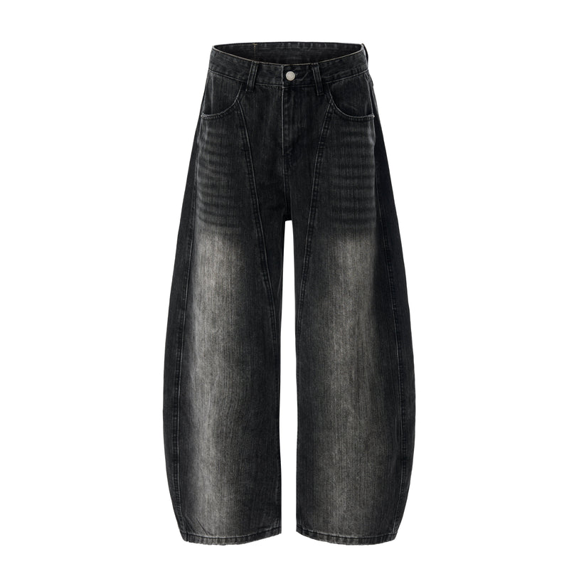 Black wide-leg jeans with curved legs, front view, faded wash and high waist
