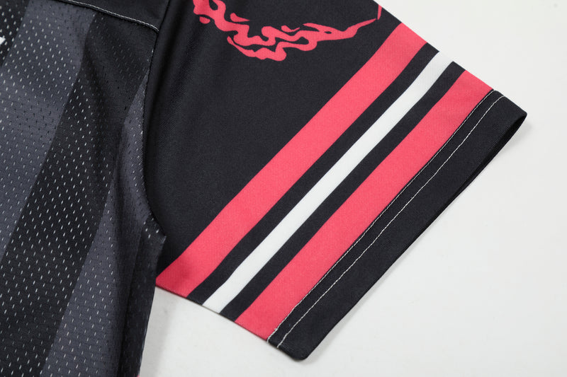 Black football jersey with red and white sleeve stripes and a bold chain graphic, number 33 details visible