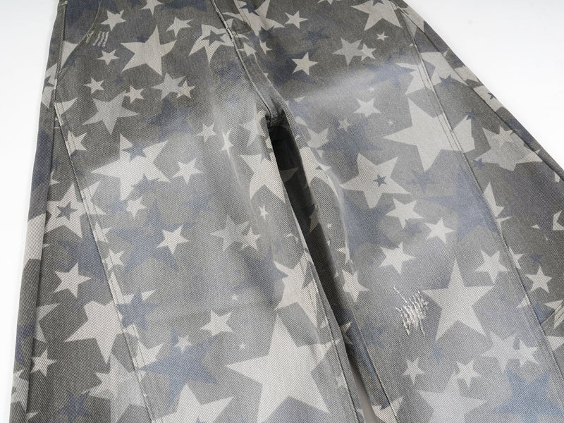 Side view of gray star print wide-leg denim pants